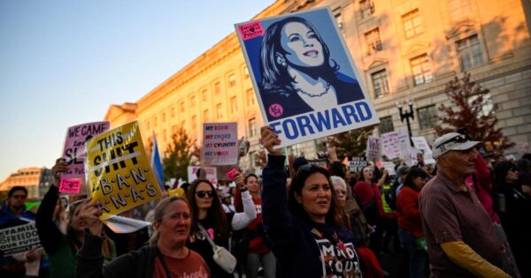 thousands of women march for their rights and for Harris